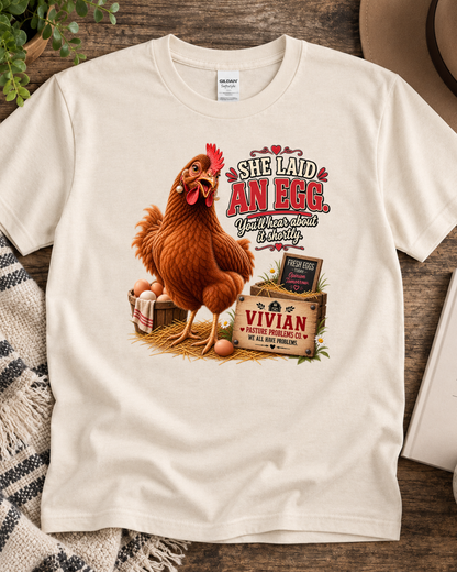 Funny chicken egg announcement T-shirt featuring Vivian